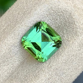 Cushion cut Green Tourmaline measuring 6.9 × 6.9 × 4.5 mm