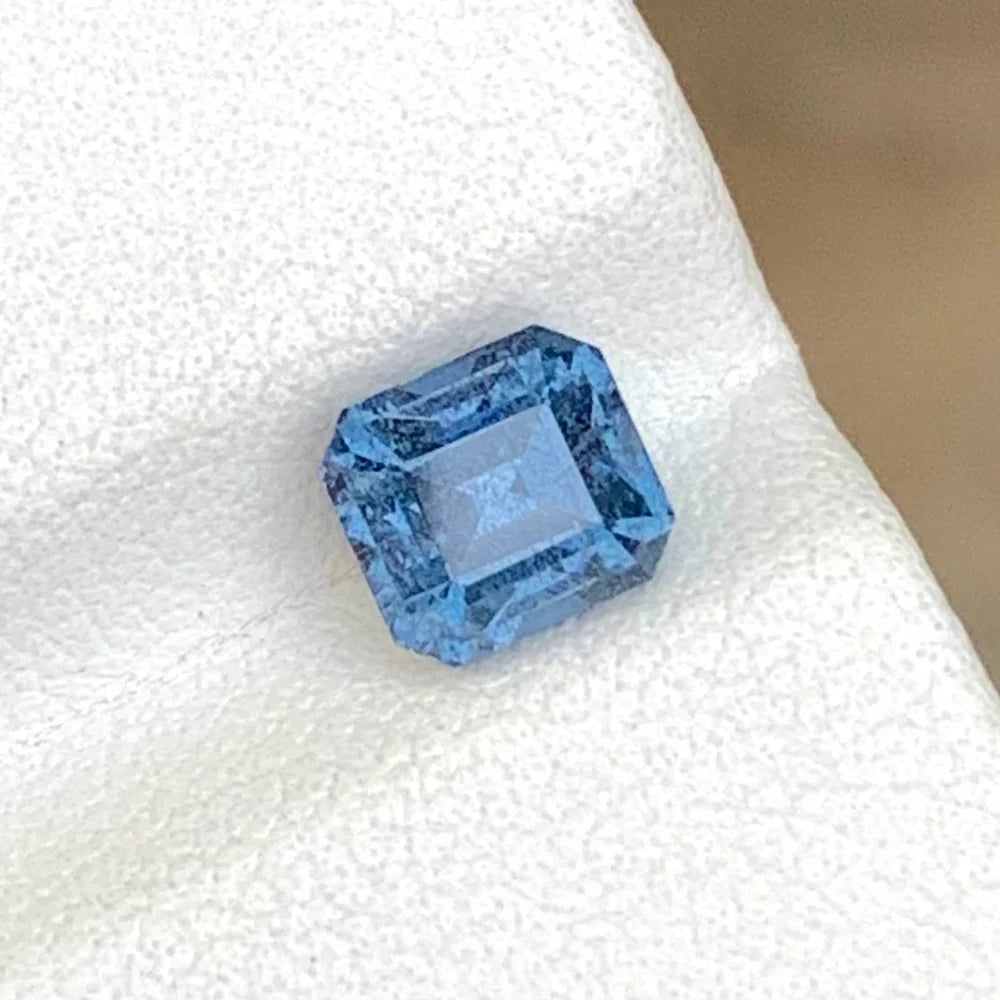 Discover the captivating beauty of this 1.60-carat natural blue spinel from Africa, expertly cut in an elegant emerald shape. Measuring 5.8 × 5.3 × 4.5 mm, this untreated loose blue spinel gemstone showcases an attractive blue color and beautiful natural brilliance.