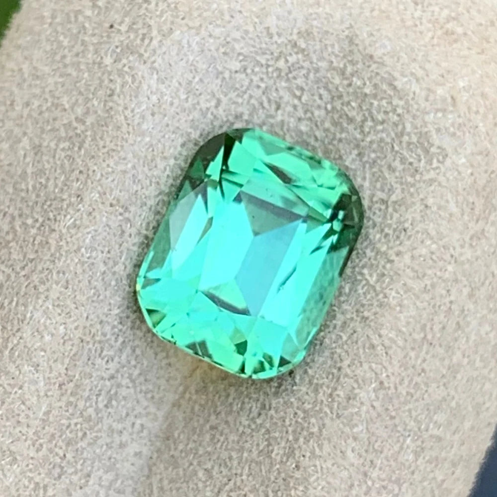 Shop 1.90 ct natural mint green Tourmaline from Afghanistan. This untreated cushion-cut loose gemstone is ideal for custom jewelry designs.