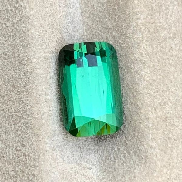 Bluish green tourmaline measuring 9.0 × 5.7 × 4.7 mm