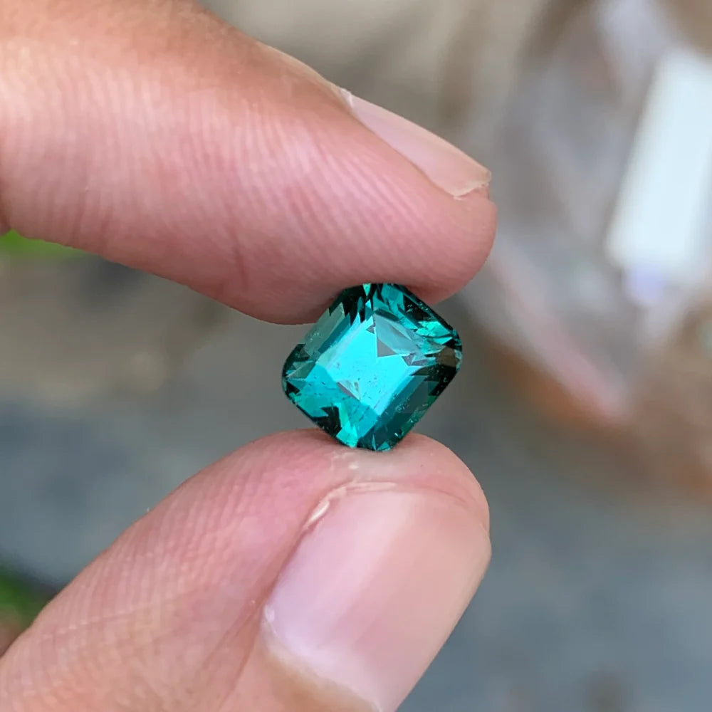 Shop a 2.45 Ct Natural Blue Tourmaline from Afghanistan with a Cushion cut. Loose gemstone with beautiful blue color, ideal for custom jewelry.