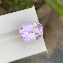 Shop a 24.05 Ct light pink Kunzite from Afghanistan with an elegant oval cut. A beautiful loose Kunzite gemstone for statement and custom jewelry.