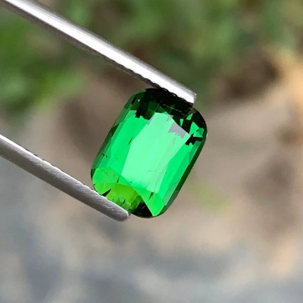 Shop 4.15 Ct Natural Bright Green Tourmaline from Afghanistan with a Cushion cut. Untreated loose gemstone for custom jewelry and collectors.