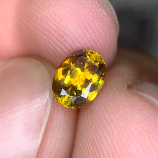 fire sphene oval cut loose gemstone