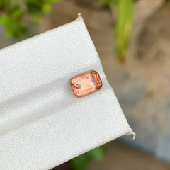 Shop this 1.95 Ct natural peach spinel from Africa with an elegant cushion cut