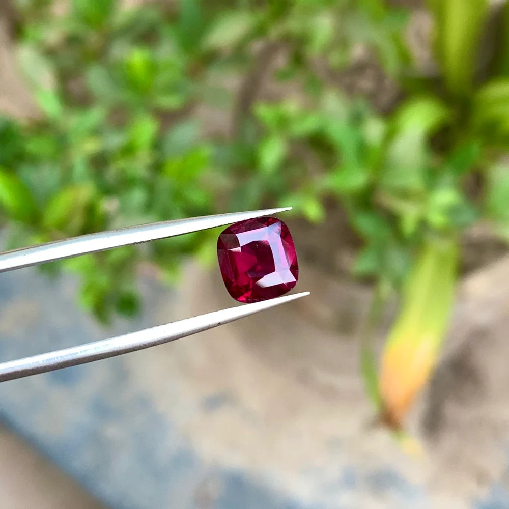 Discover the vibrant beauty of this 2.95-carat Natural Rhodolite Garnet from Africa, featuring an elegant Cushion cut and a captivating deep pinkish red color. Measuring 8.4 × 7.9 × 4.5 mm, this loose Garnet offers an attractive combination of rich color, balanced proportions, and a classic gemstone shape.