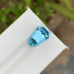 Discover the refreshing beauty of this 5.60-carat Sky Blue Topaz from Brazil, featuring an elegant Shield cut